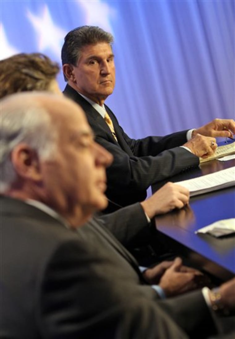 West Virginia Governor Joe Manchin looks in the direction of Republican candidate John Raese as he waits for the start of West Virginia Senate debate in on Monday.